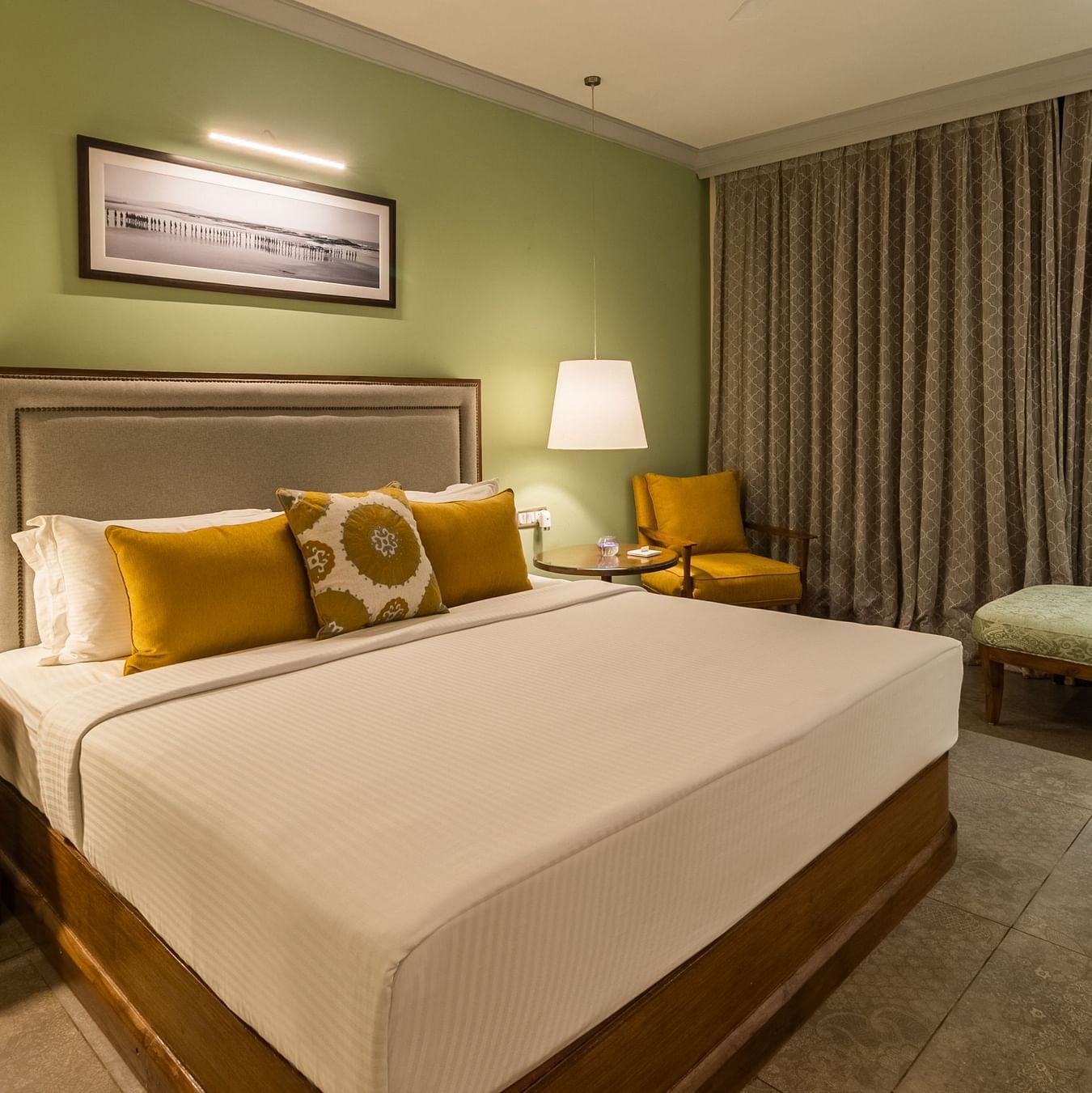 grande club rooms in south goa designed with a cosy bed and elegant interiors - kids friendly resort in south goa