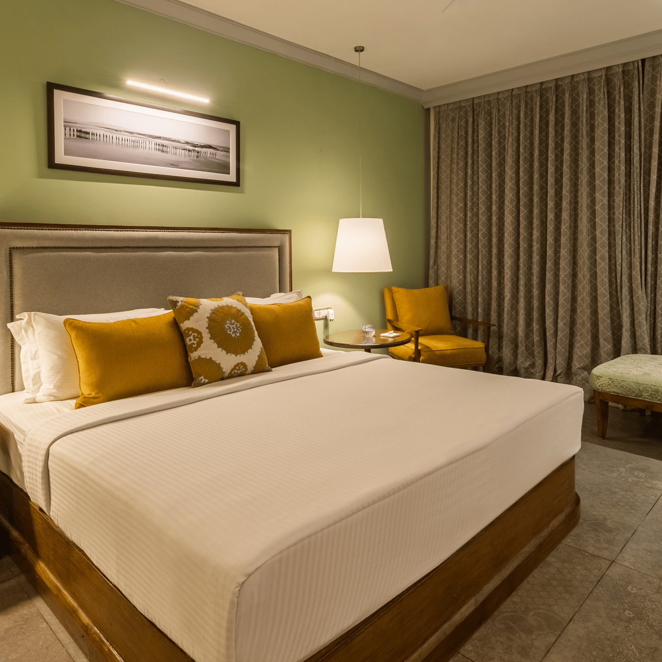 club rooms in south goa designed with a cosy bed and elegant interiors - kids friendly resort in south goa