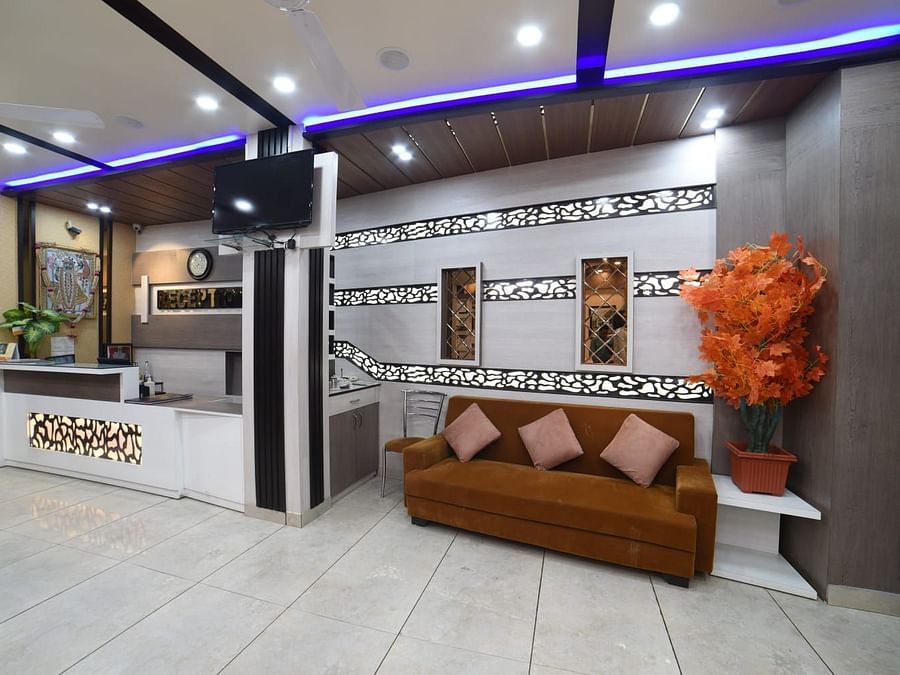Sofa and the reception counter at Hotel Panchvati Inn