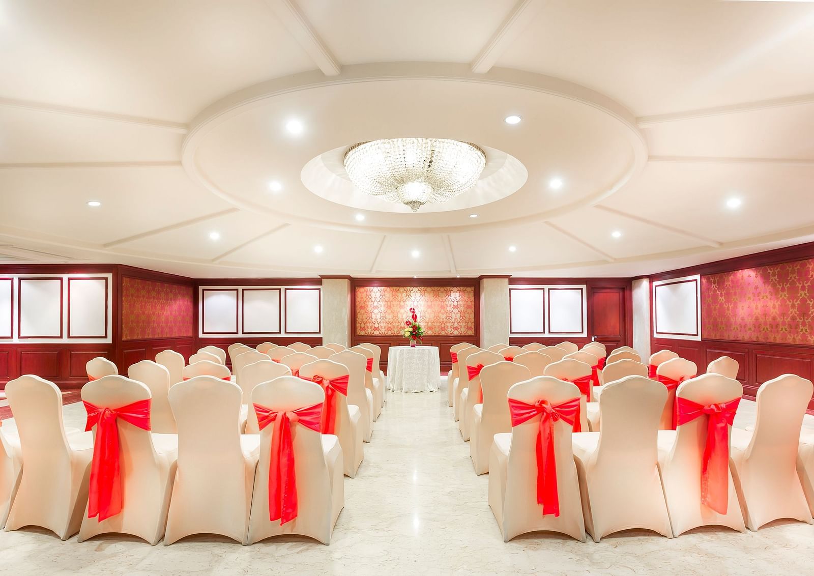 Lotus GC banquet hall seating with chairs at Grand Chennai By GRT Hotels.