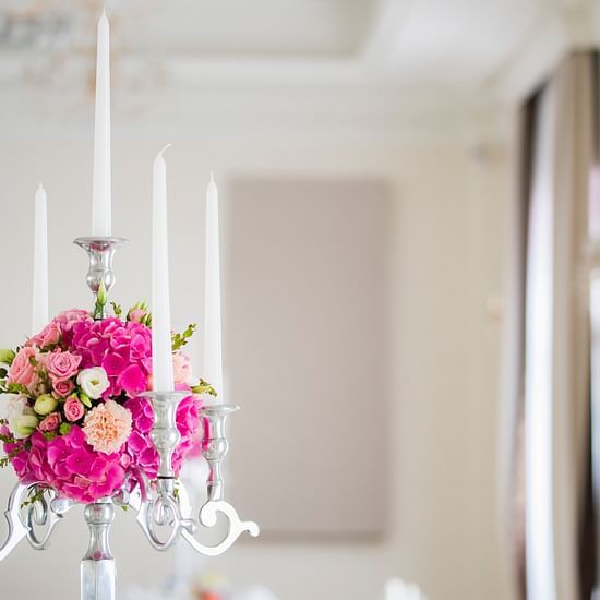 A candle arrangement at a banquet hall