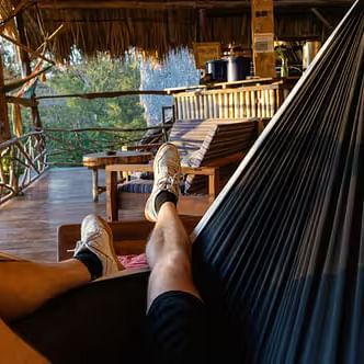 a person relaxing on a deck