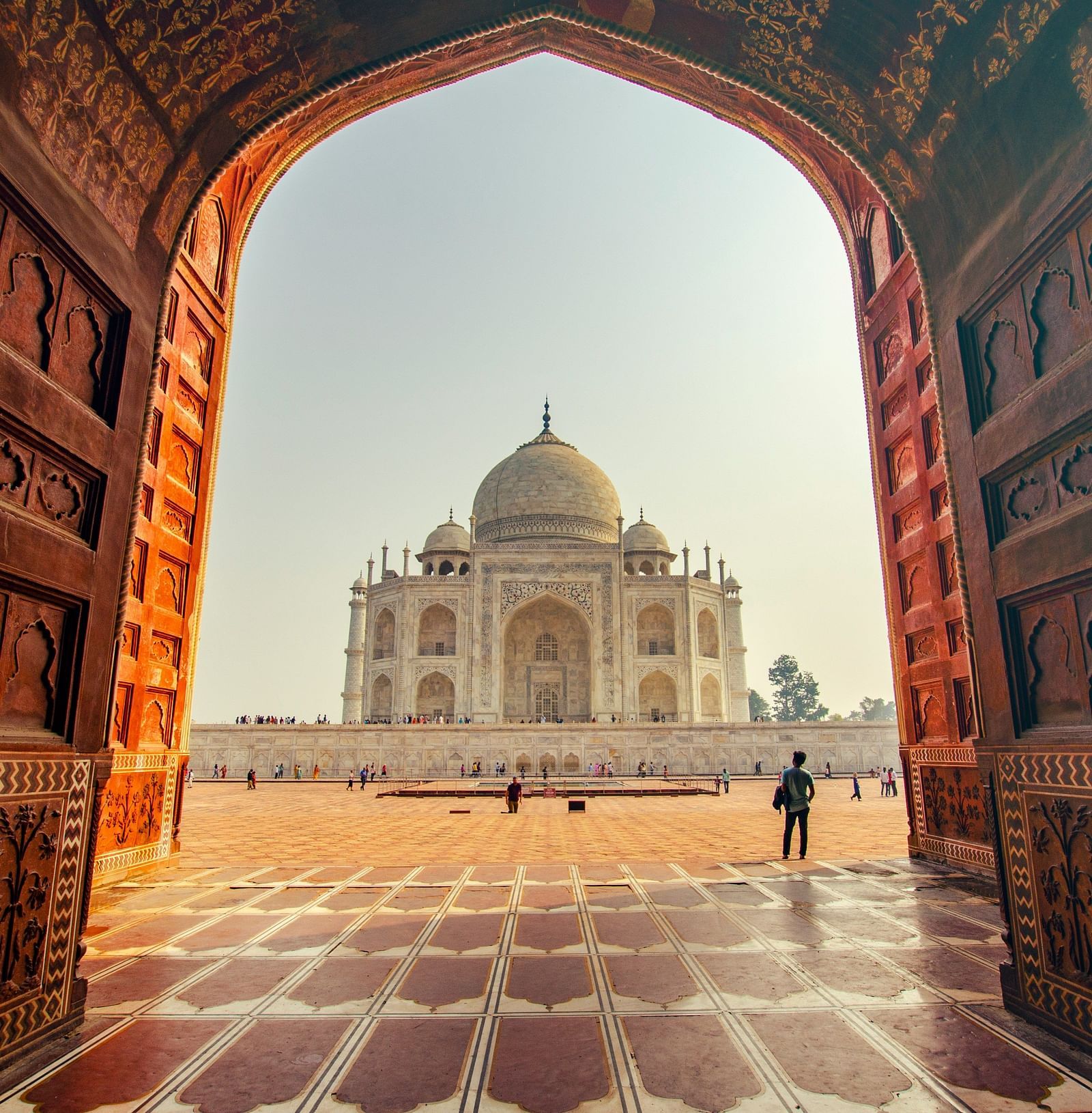 a beautiful image of the taj mahal at the golden hour