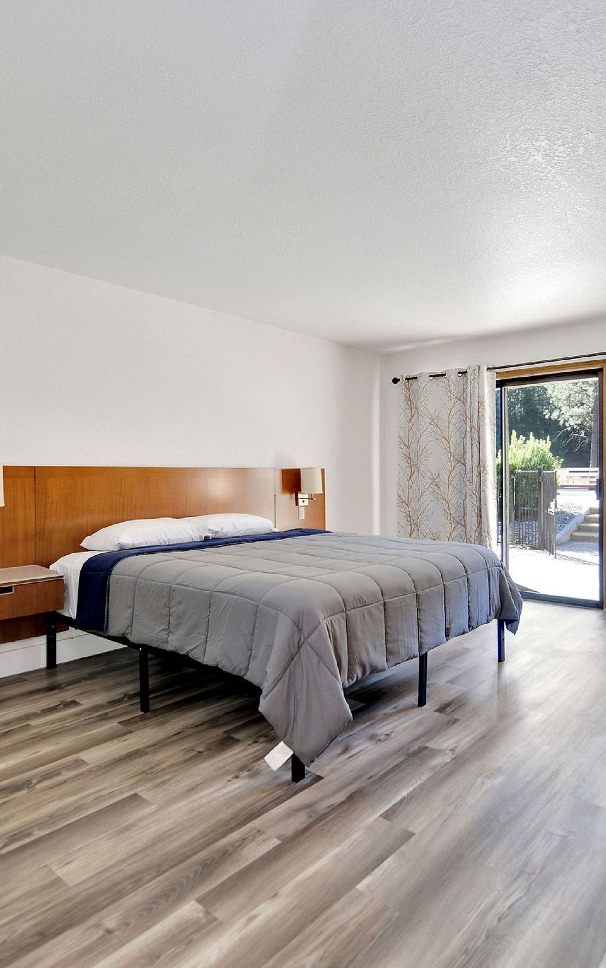 A view of a room at Amador Hotel with a double bed.