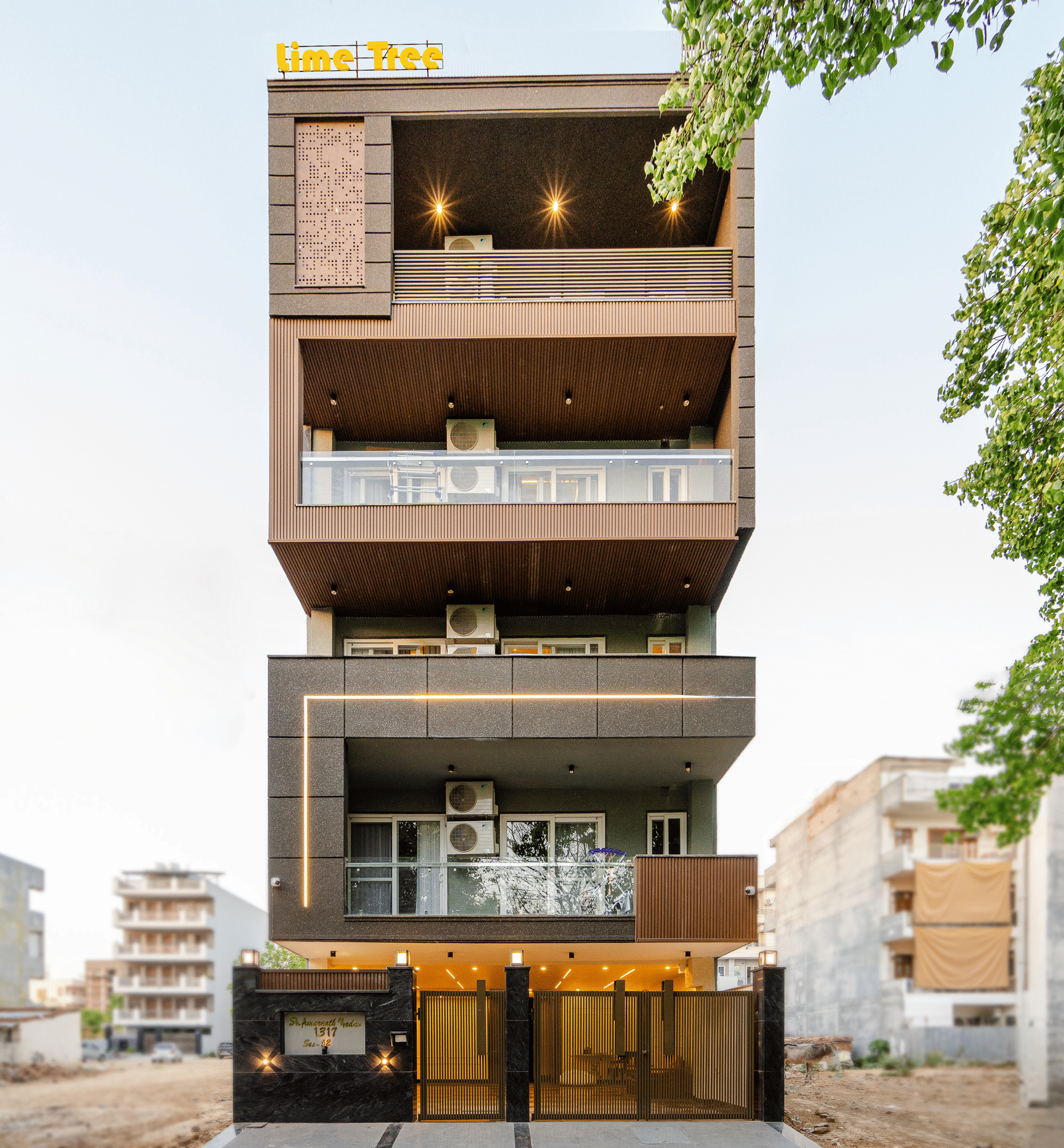 Exterior view of a multi-storey serviced apartment building with balconies at Lime Tree 1BHK Service Apartment Near Artemis Hospital Gurgaon.