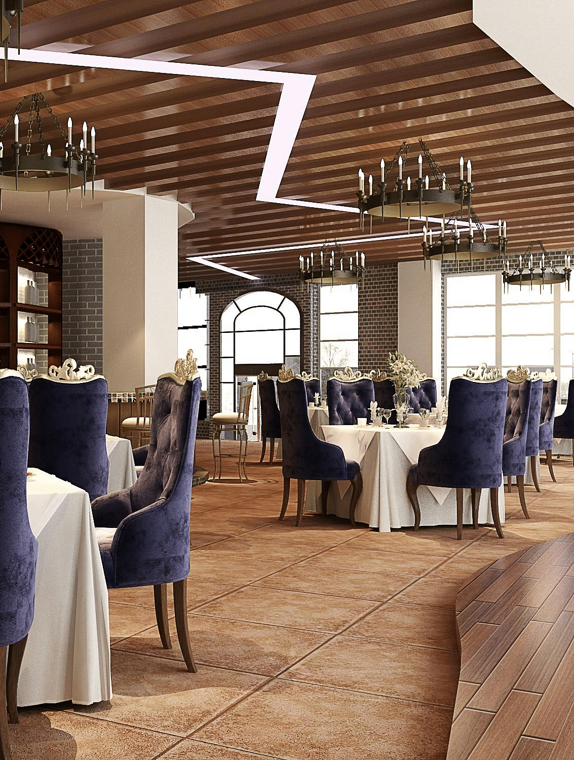 Elegant restaurant dining area with set tables, dark blue chairs, and decorative chandeliers.
