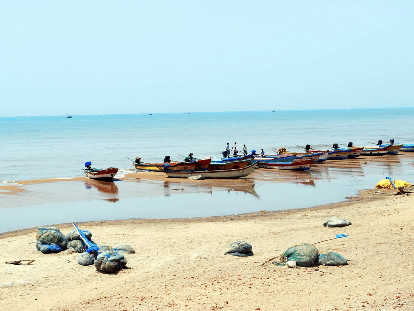 Boats queued up on the beachside, one of the scenic sights among Tharangambadi tourist places.
