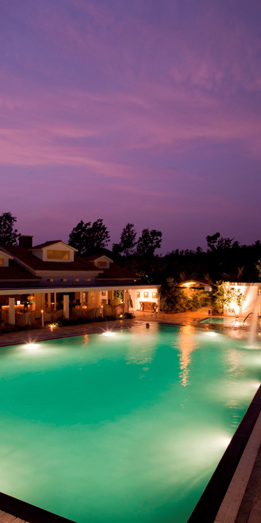 Dining by the pool, Amanvana Resort And Spa, Coorg Resort