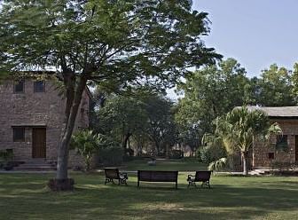An image of the outdoor seating area with lush greenery around  - MANVAR Resort & Desert Camp
