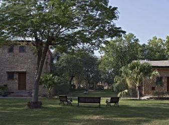 An image of the outdoor seating area with lush greenery around  - MANVAR Resort & Desert Camp