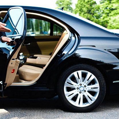 a person opening a car