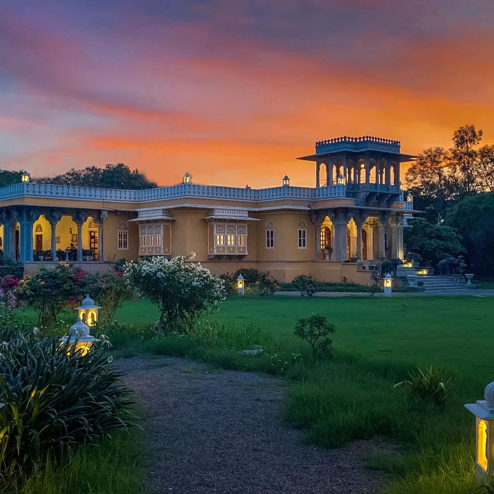 Facade image of Dev Shree, deogarh featuring a beutiful sunset in the background
