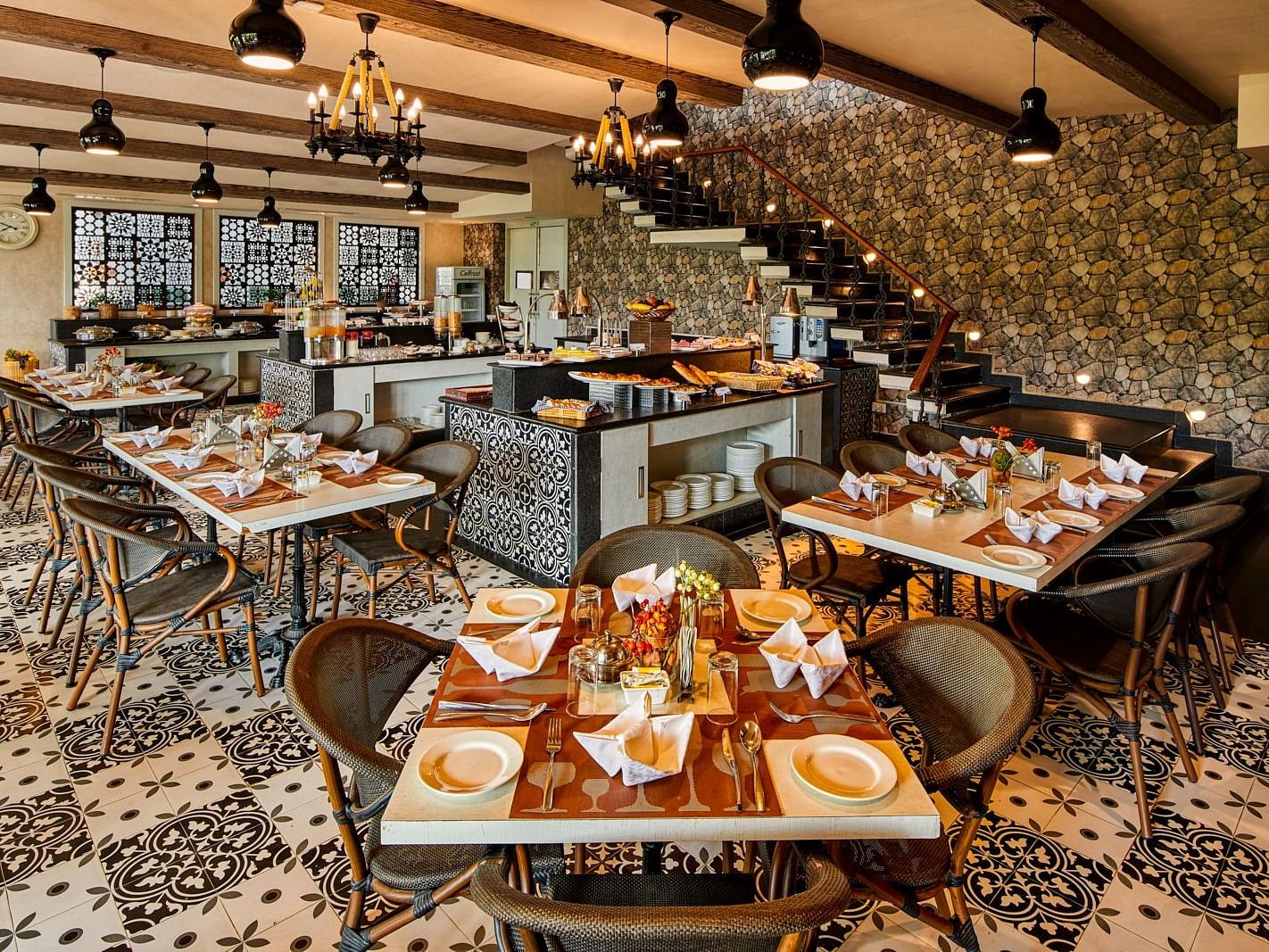 Seating arrangement at Orana Restaurant at Swosti Chilika Resort
