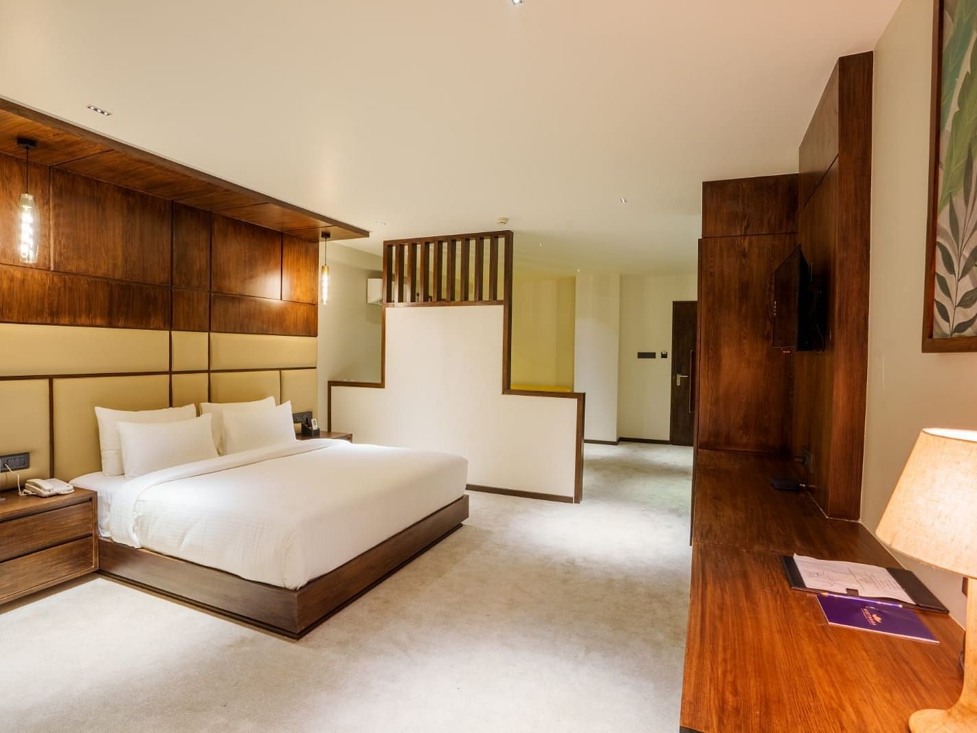 Image of a double bed at the Suite at Visthara - Urban Boutique Hotel