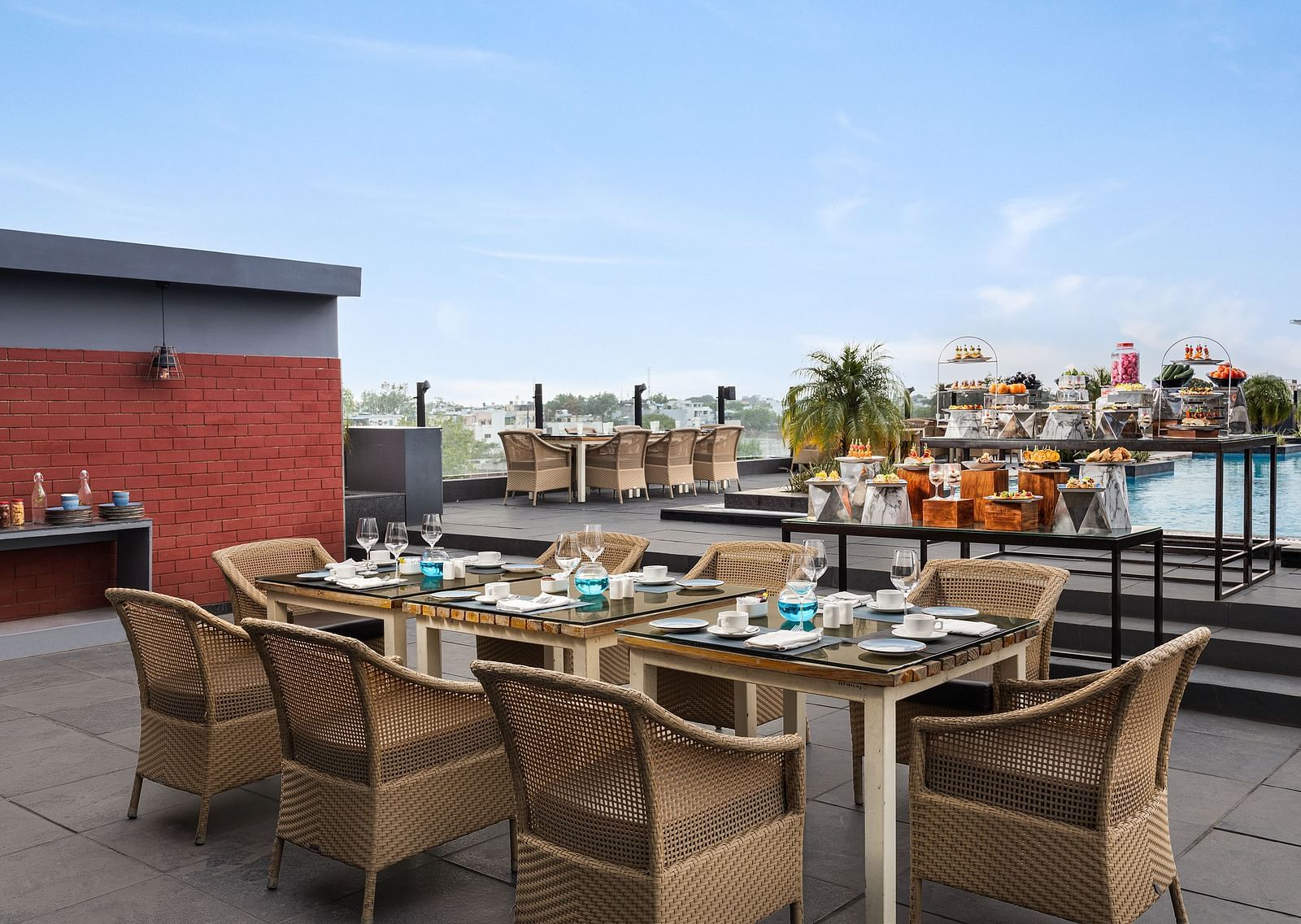 Rooftop seating arrangement at Essentia Luxury Hotel, Indore