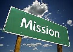 A board with mission written on it