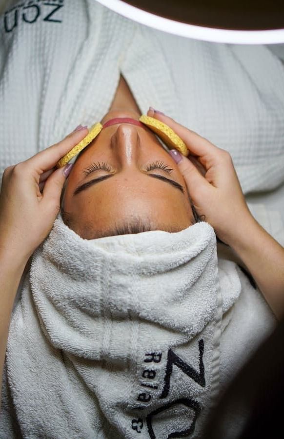 Image of a lady getting a face spa 