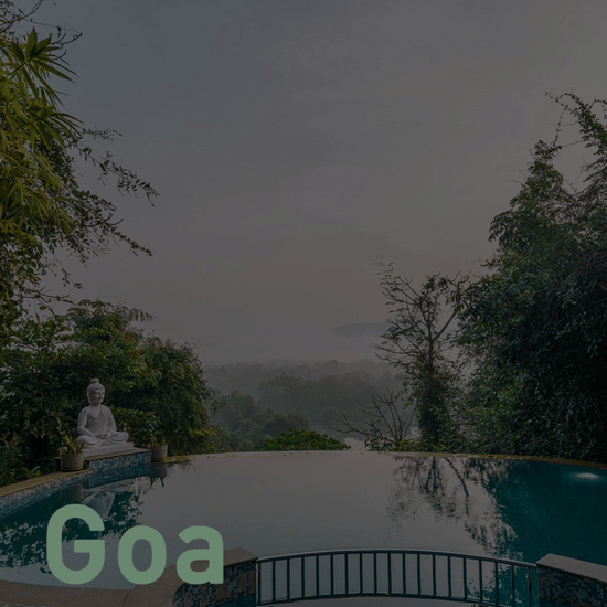 Nature Trails Rock Valley Goa hotel card featuring infinity pool overlooking lush greenery in Goa