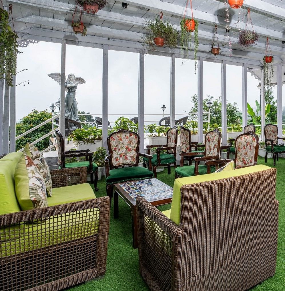 Open-air dining area at Summit Barsana Resort & Spa, Kalimpong