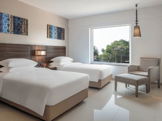 Twin Room with two bed overlooking the pool at The Residency Towers Rameswaram
