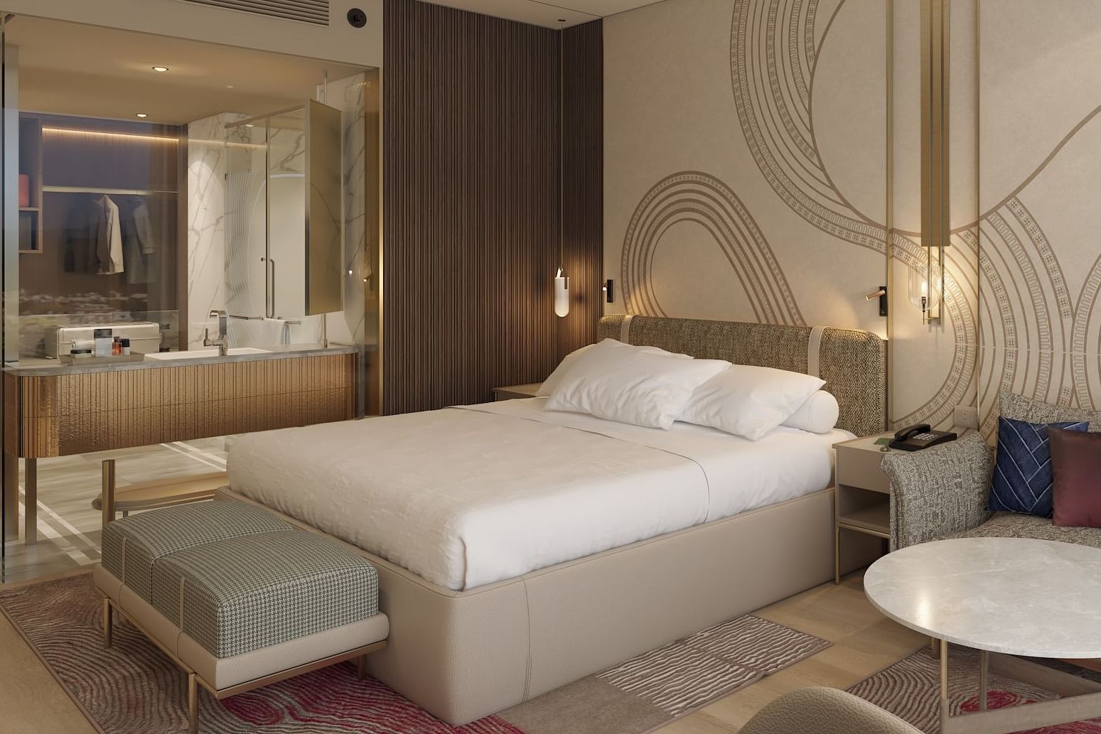 A double bed room with sofa and table, work desk and chair and rug