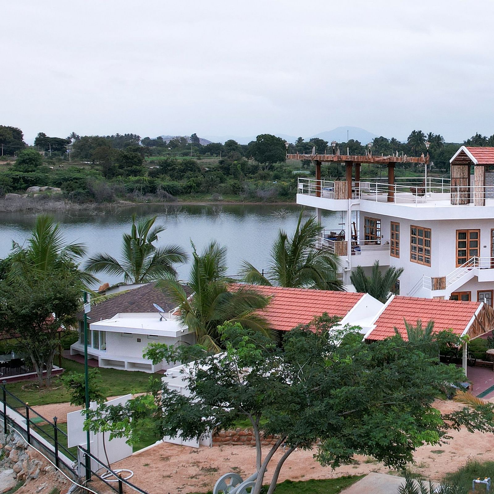 Birds eye view of a property next to  a water body