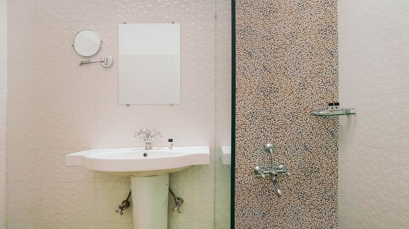 Image of a wahsroom with seperate shower area at Summit By The Ganges Beach Resort & Spa, Rishikesh