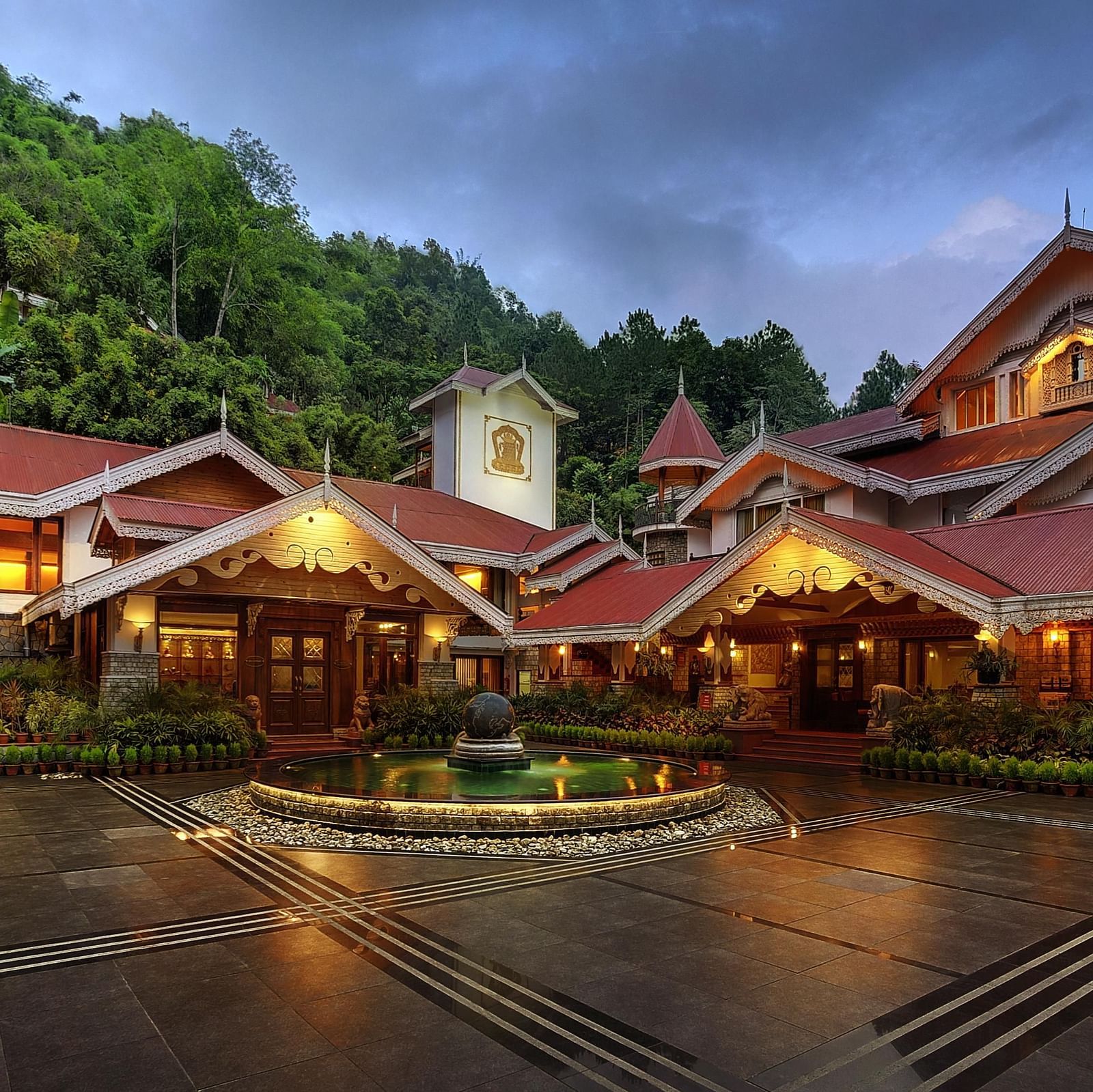 the exterior facade during night time -  Mayfair Spa Resort & Casino Gangtok 