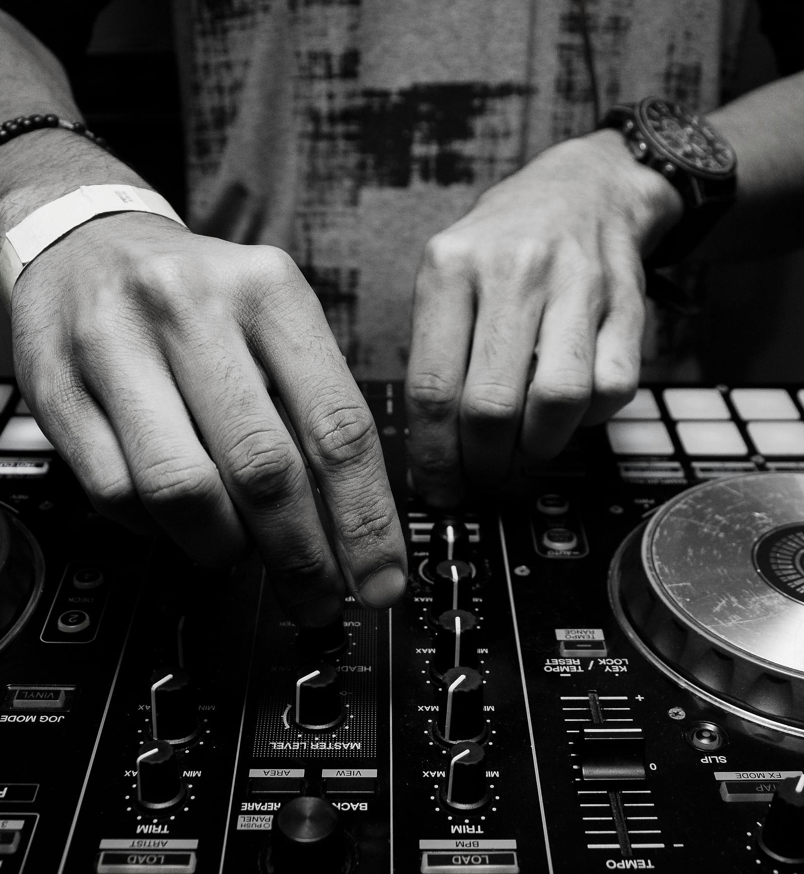 A dj handling their controller |  Mango Hill Central, Chennai