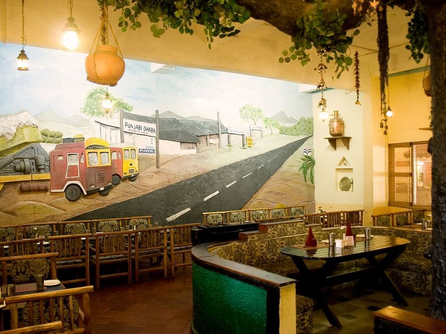 Ramanashree California Resort - view of the Dhaba 1995-style restaurant with indoor seating options