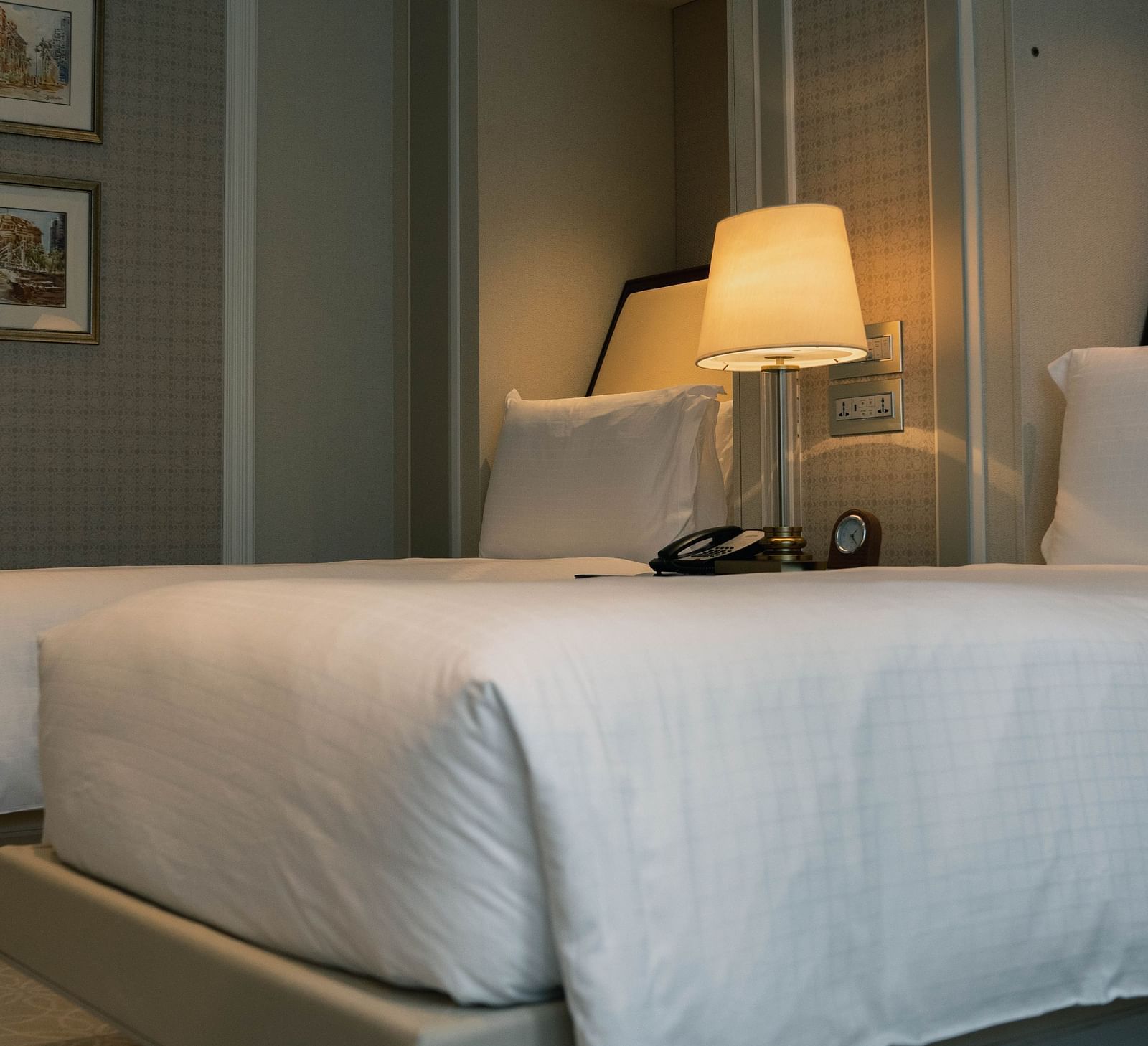 Twin beds with white bedding
