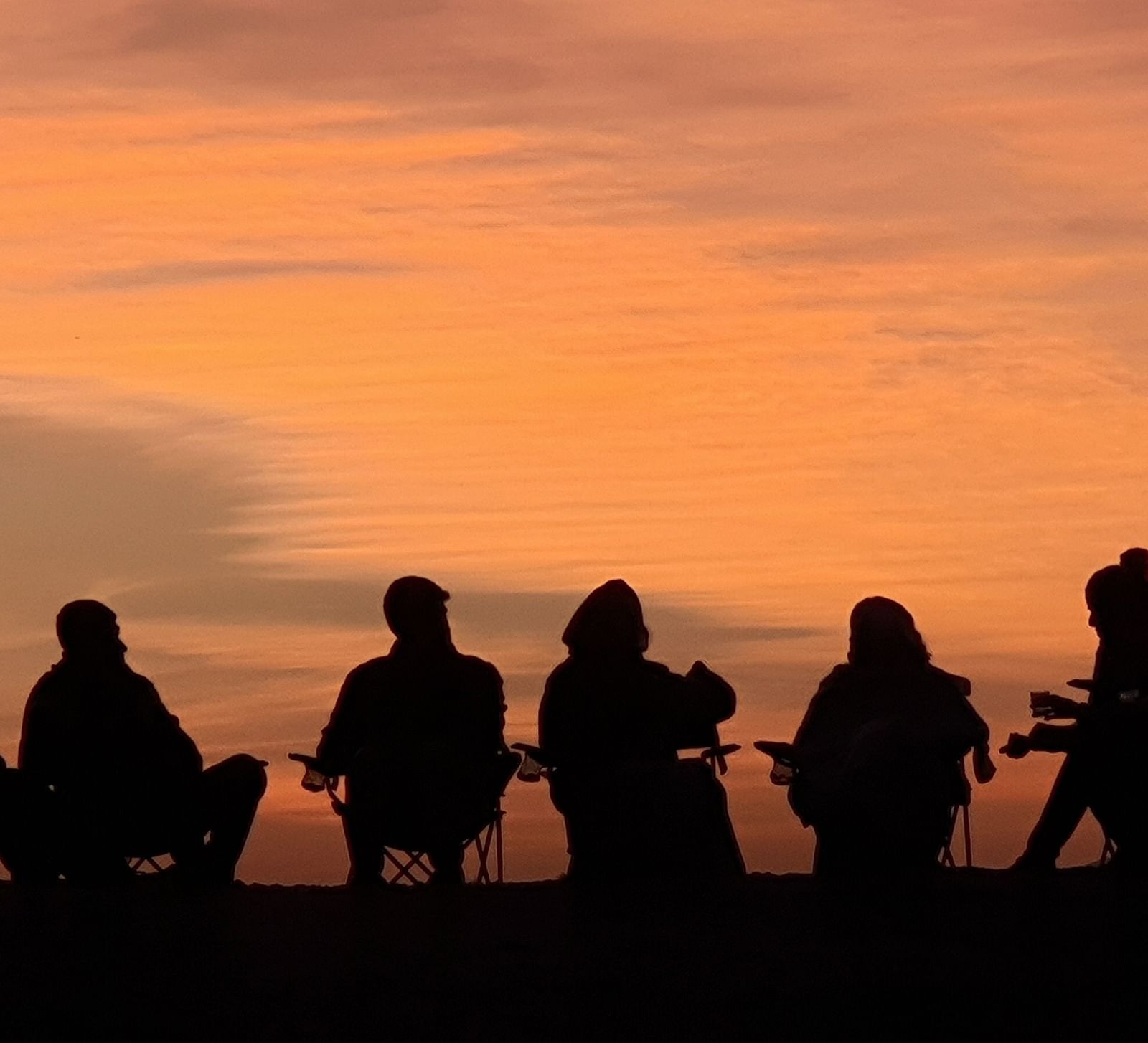 image of a group of People enjoying the sunset - Dev Shree, Deogarh