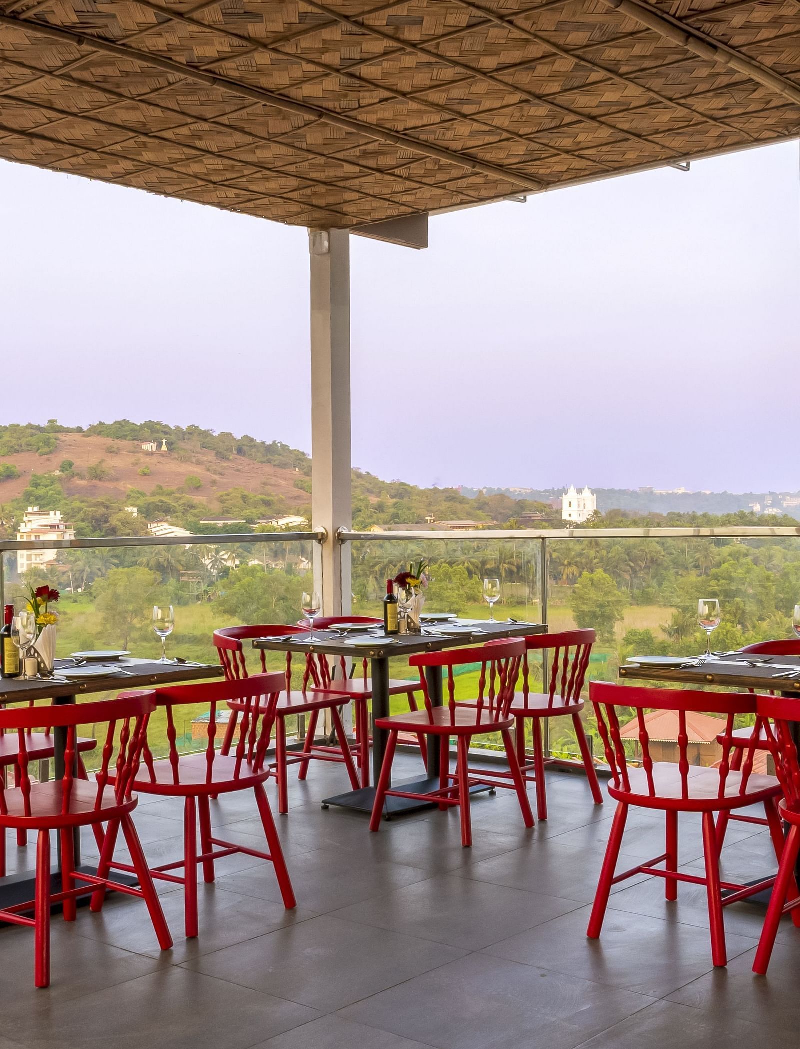 A al fresco seating arrangement inside the in-house restaurant - The Tanisi Hotels & Resorts, Goa
