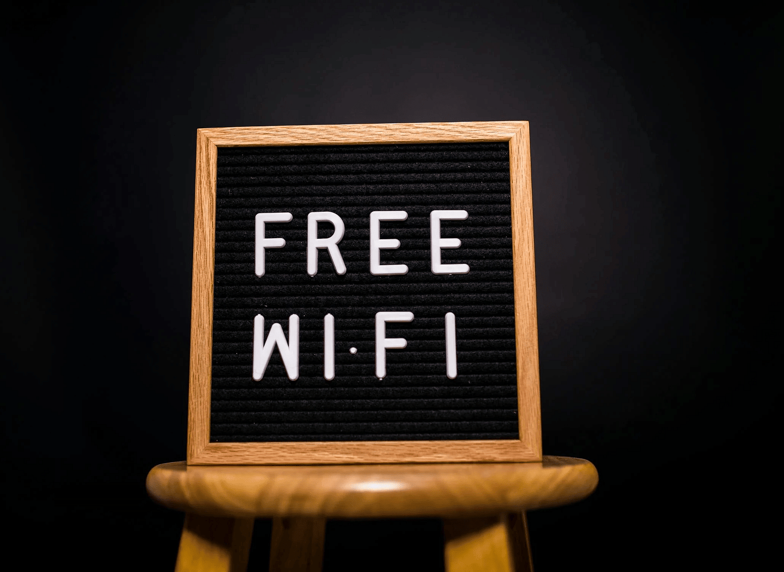 Image of a board with Wi-Fi written on it.