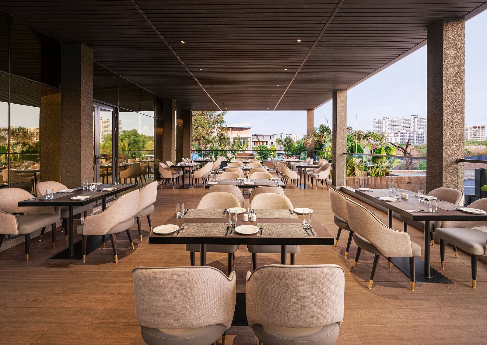 A view of dining area at Citron Bar with comfortable seating at Essentia Premiere, Pune.