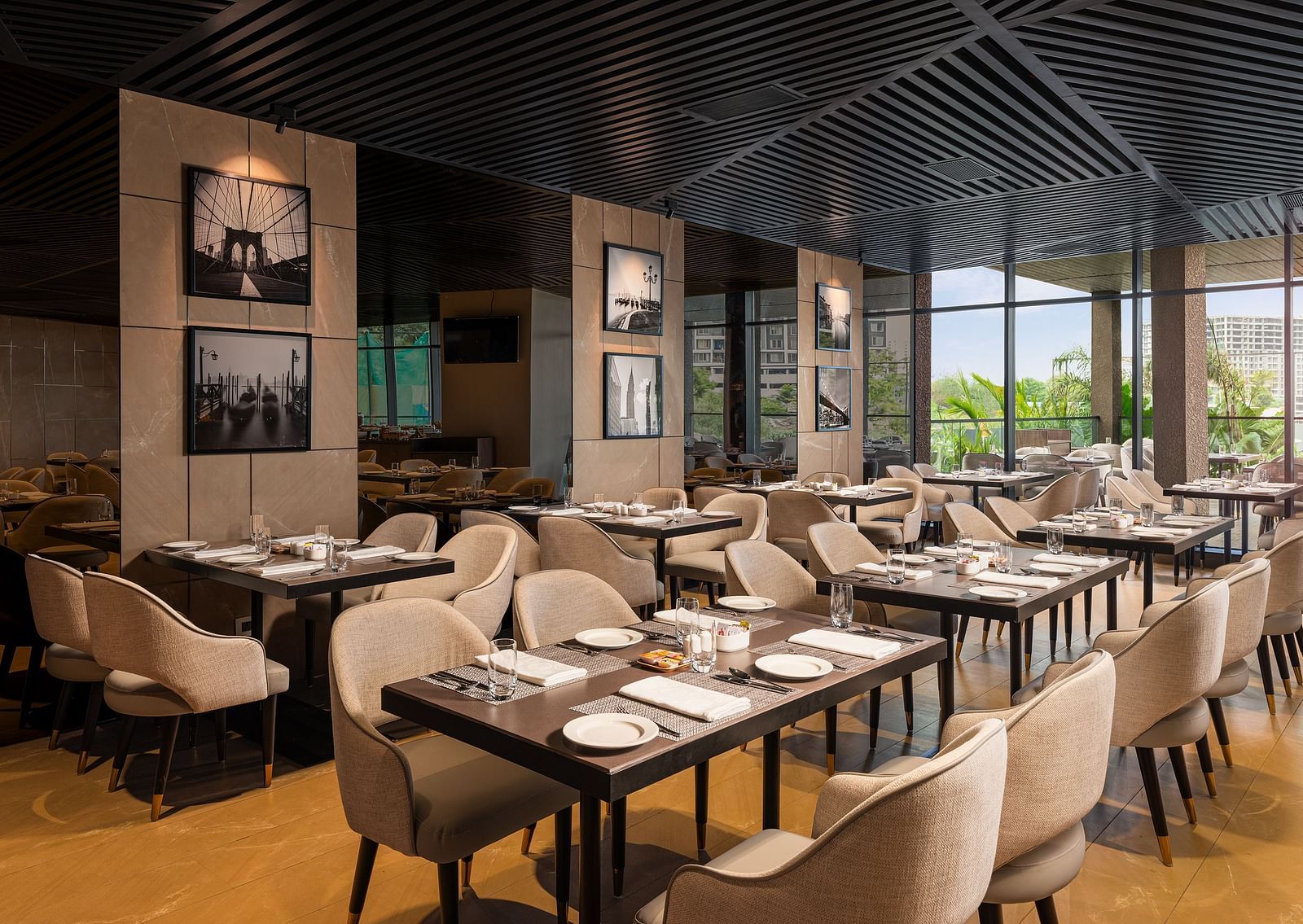A view of dining area at Citron Bar with comfortable seating at Essentia Premiere, Pune.