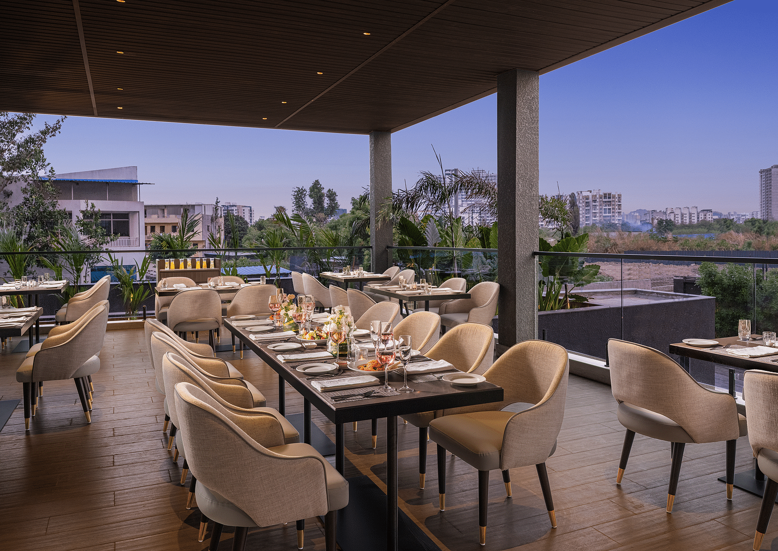 A view of dining area at Citron Bar with comfortable seating at Essentia Premiere, Pune.