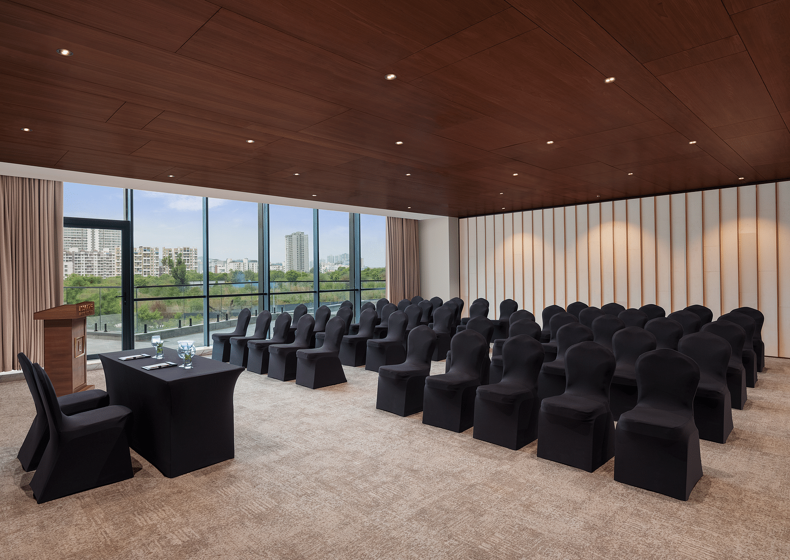 Carnival 1 with comfortable seating facing the stage at Essentia Premiere, Pune.