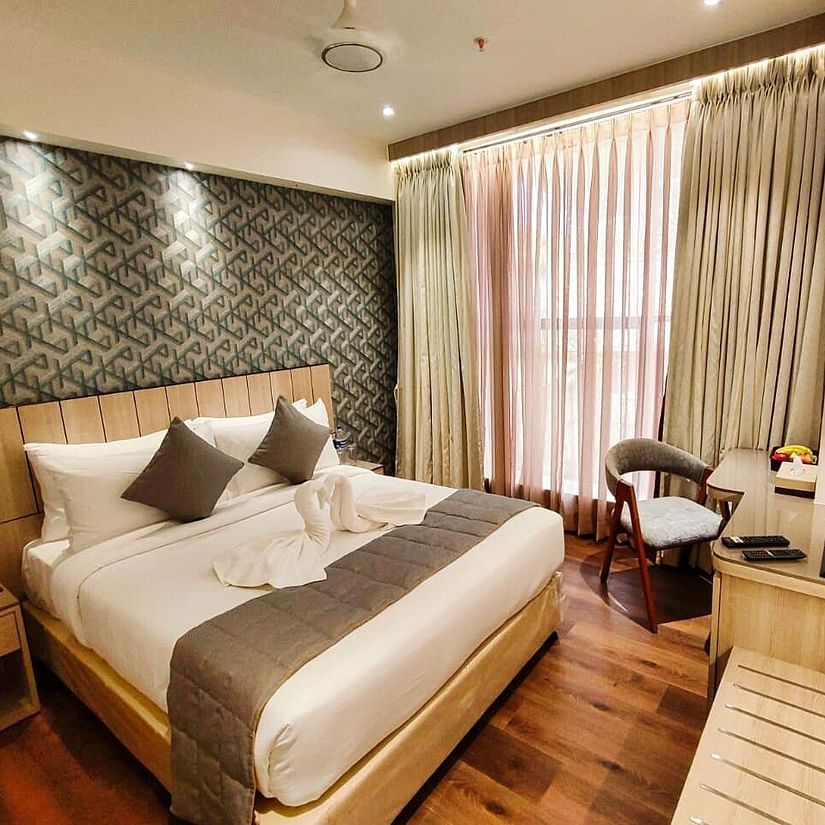Side view of hotel room with modern amenities at Maxxvalue Hotel MIDC,  Mumbai