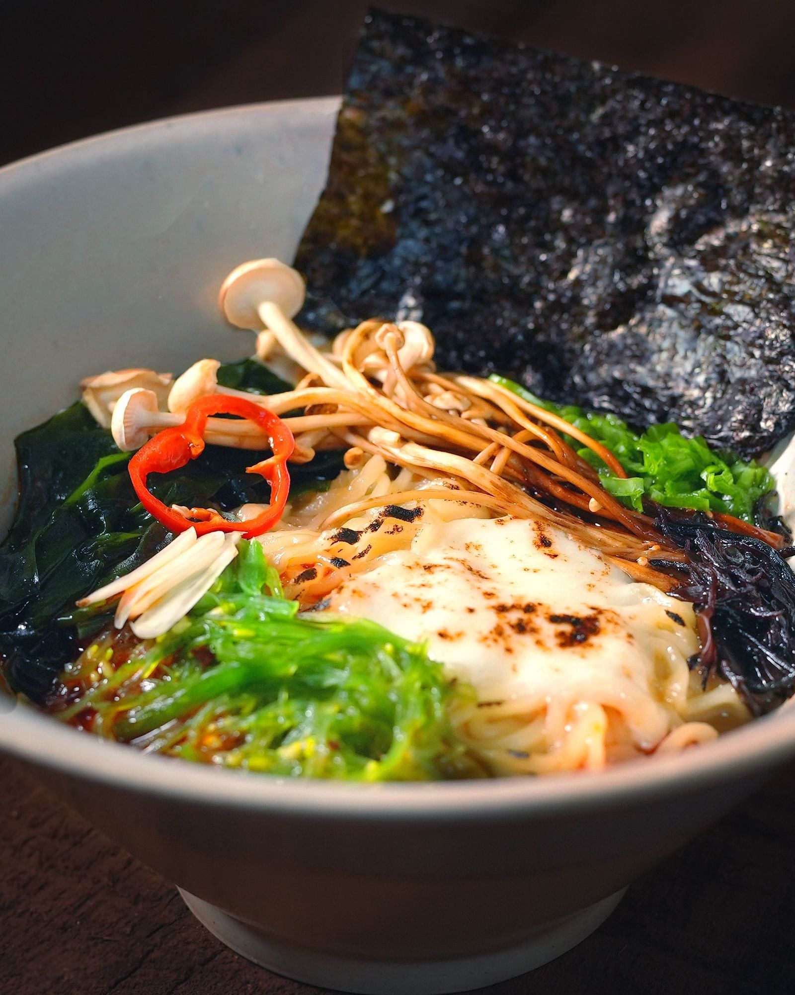 Army ramen dish served in a round bowl